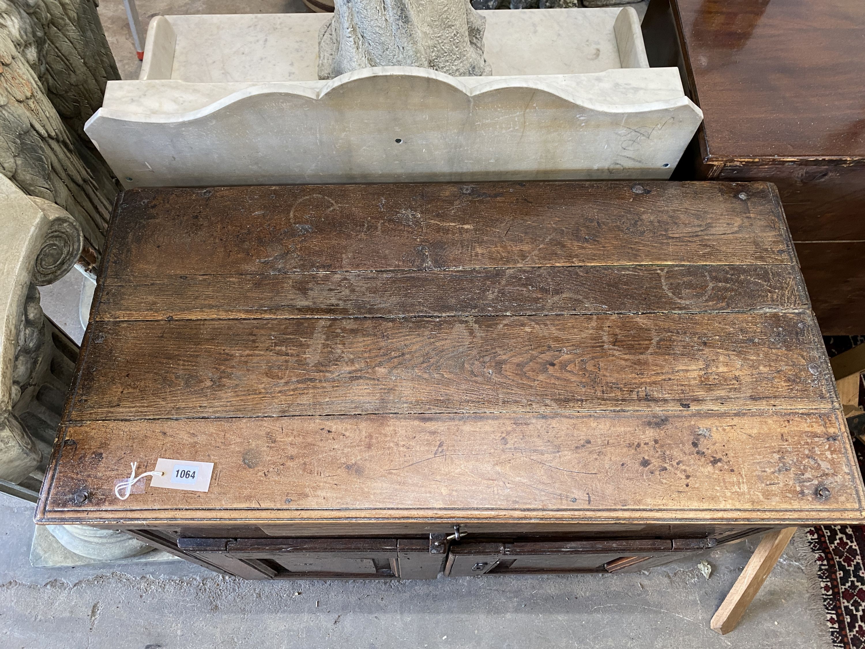 An 18th century and later oak and fruitwood side cabinet, width 100cm, depth 50cm, height 84cm